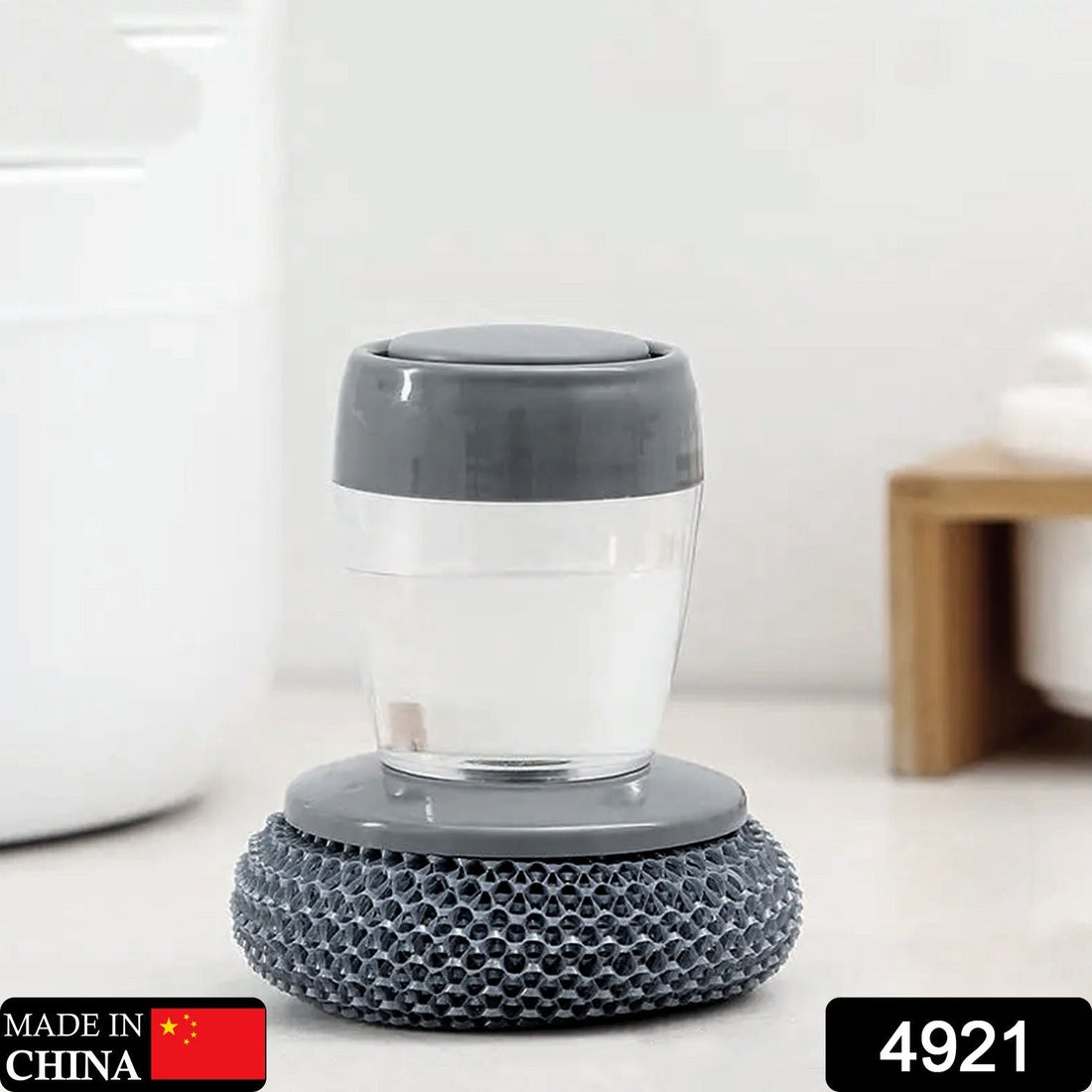 Soap dispensing dish brush with ergonomic handle for easy kitchen cleaning